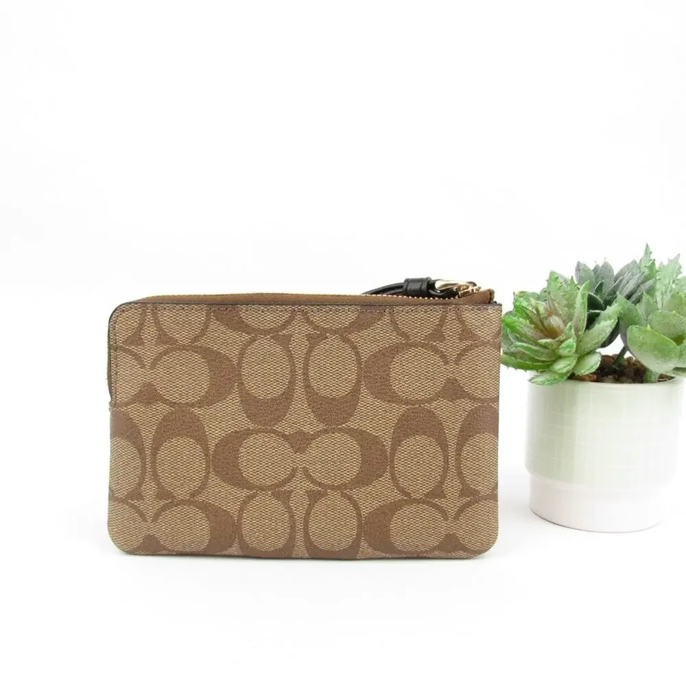 Coach Corner Zip Wristlet In Signature Canvas